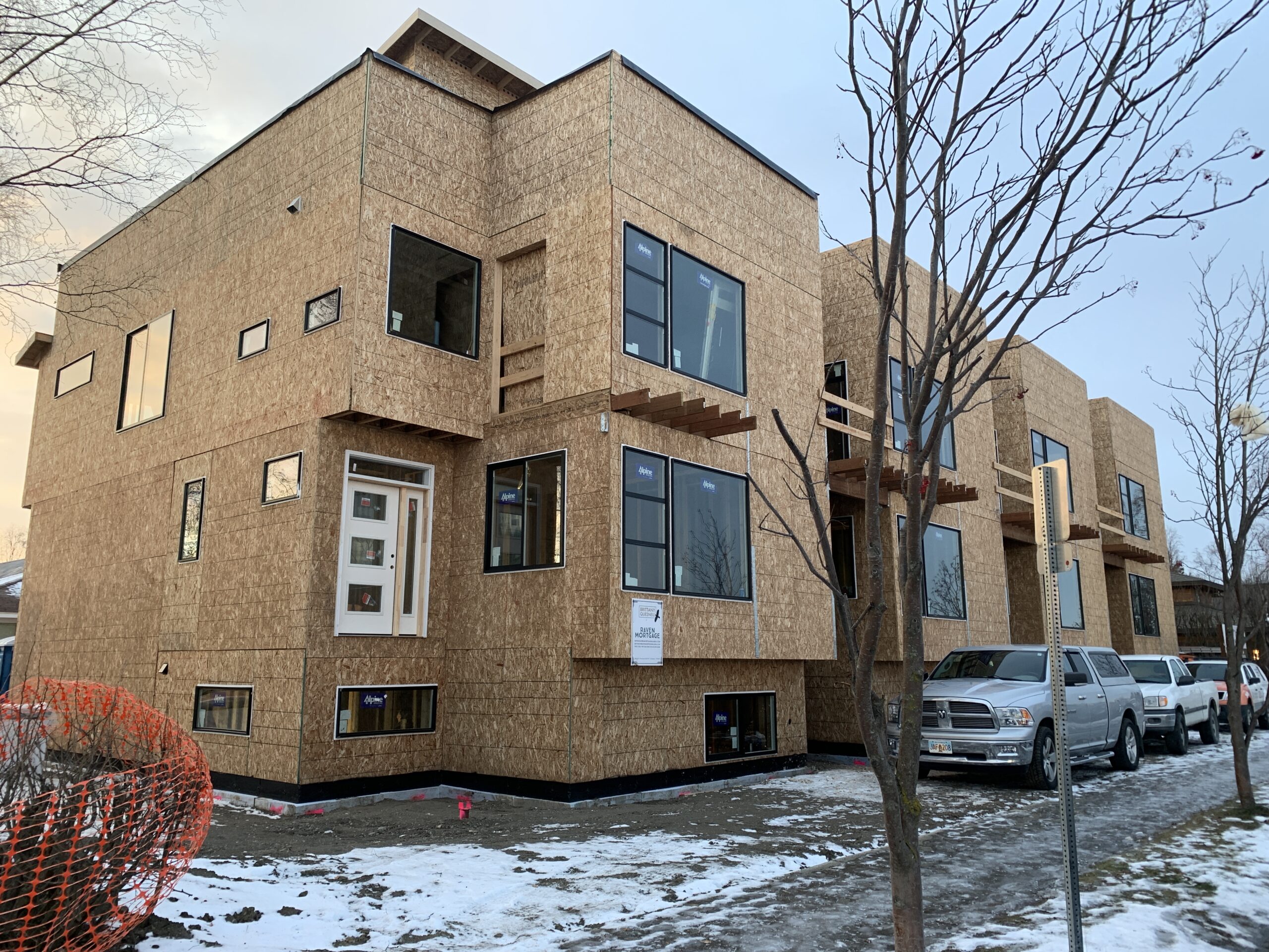 Contemporary townhouses along Delaney Park are nearing completion