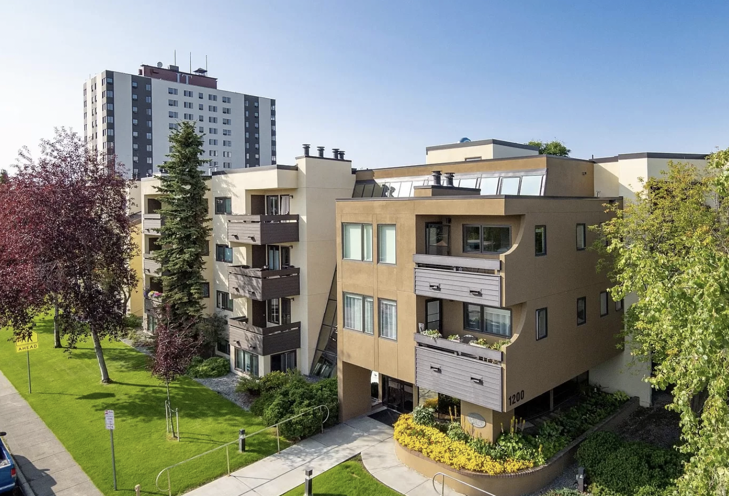 This unassuming South Addition condo offers a secret rooftop sunroom.